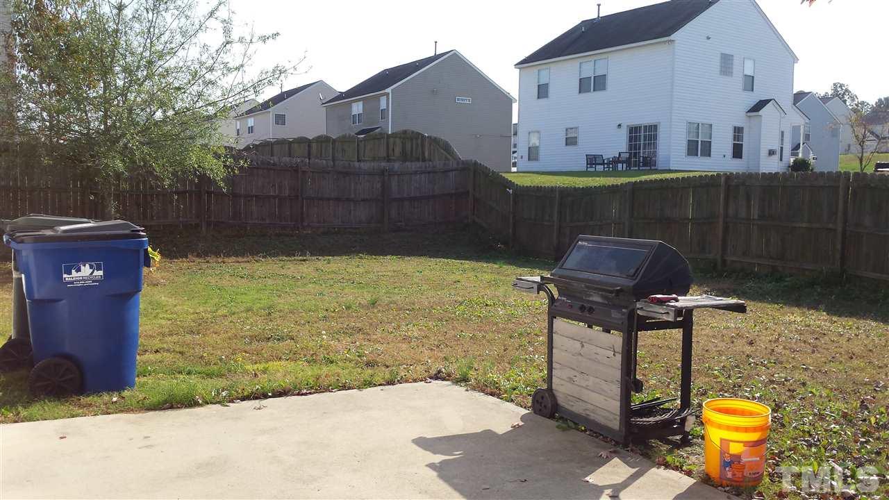 6912 Missionary Ridge Drive Raleigh, NC 27610 - Photo 4 of 16 a view of a chairs and table in the patio