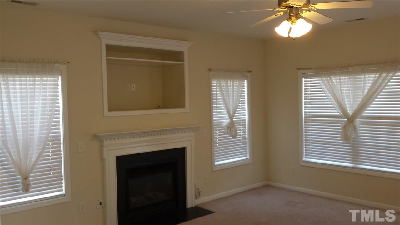 6912 Missionary Ridge Drive Raleigh, NC 27610 - Photo 8 of 16 a view of a livingroom with a fireplace