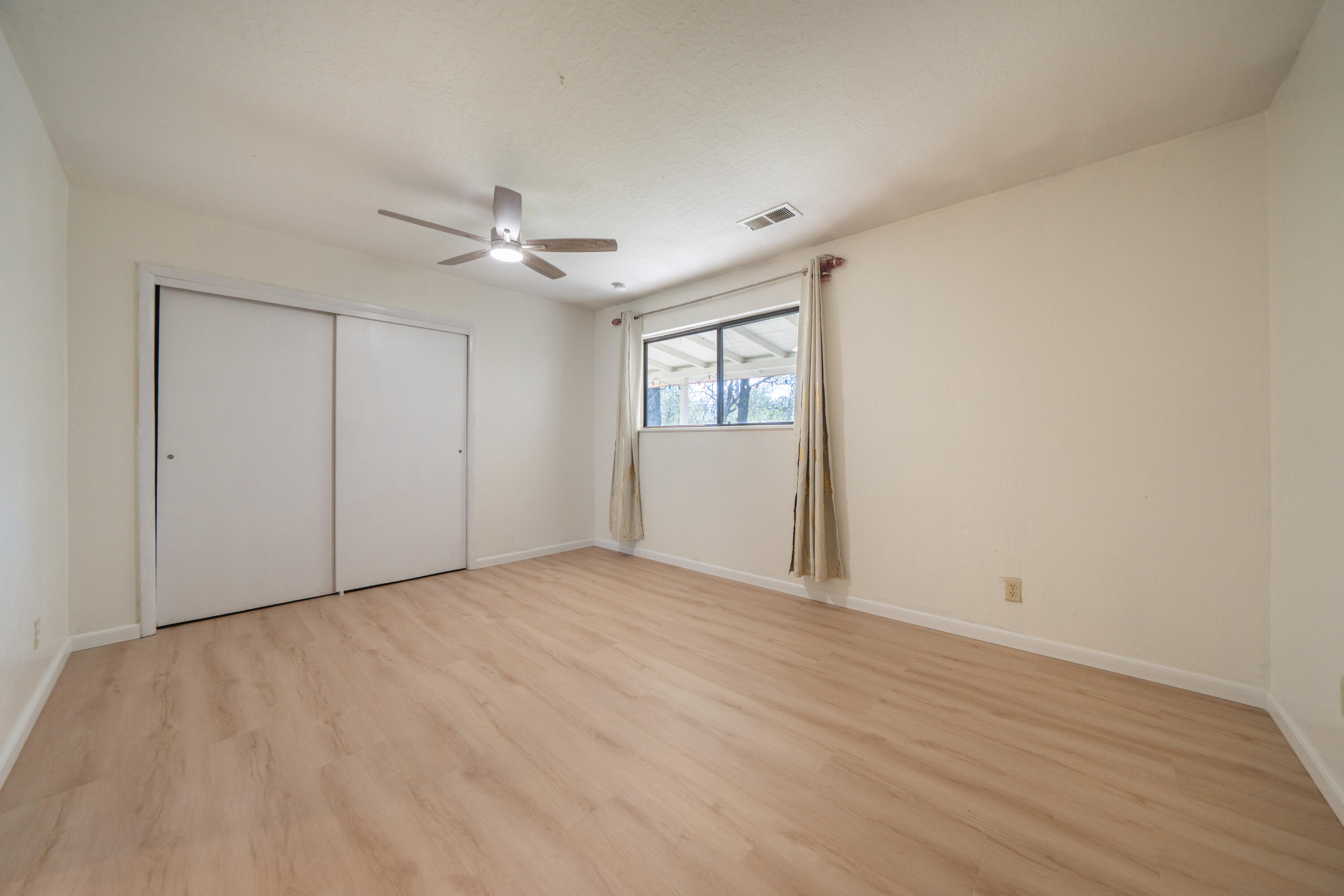 2580 Keswick Dam Road Redding, CA 96003 - Photo 20 of 60 a view of an empty room with a window