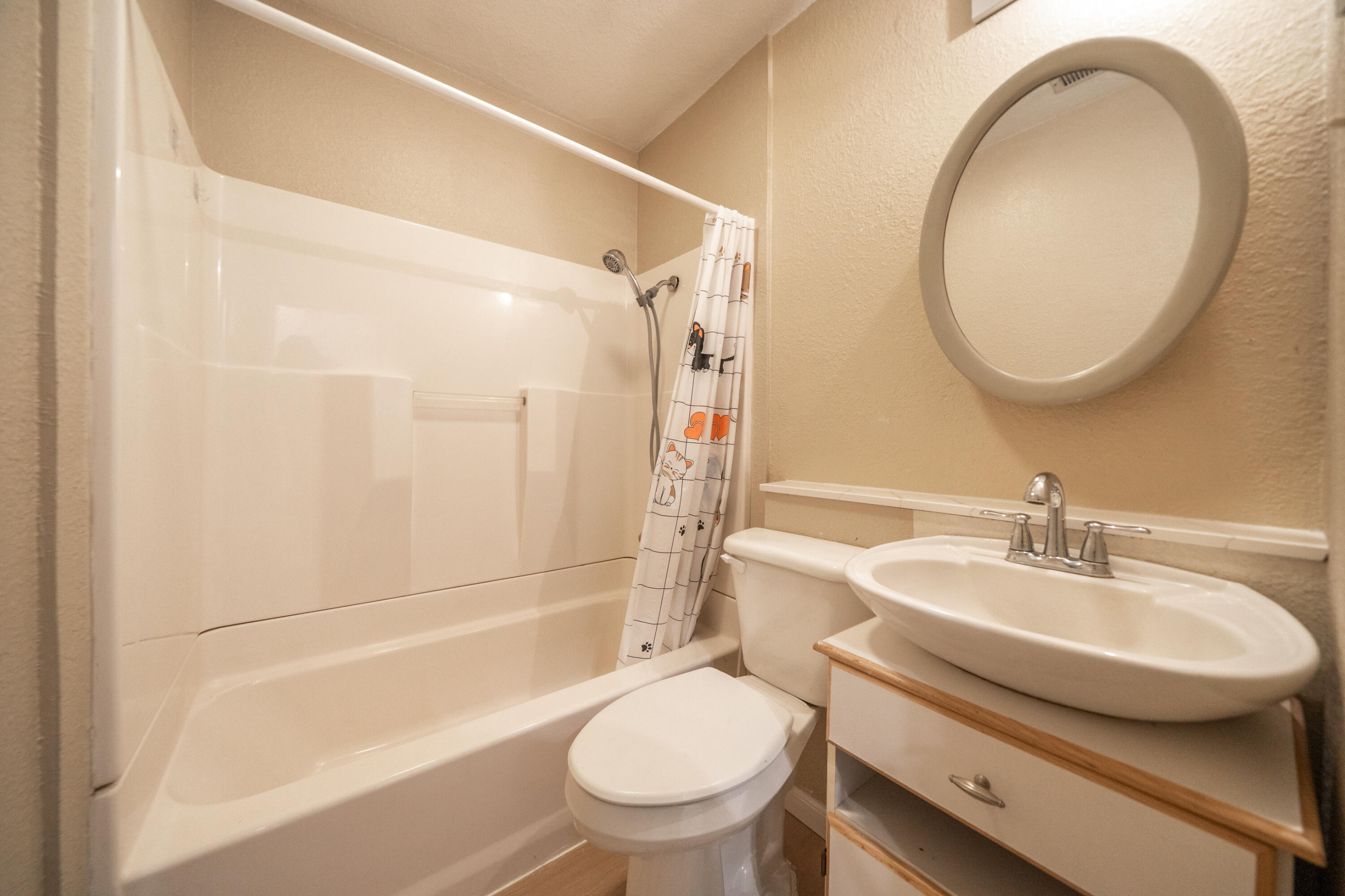 2580 Keswick Dam Road Redding, CA 96003 - Photo 22 of 60 a bathroom with a sink a toilet and a mirror