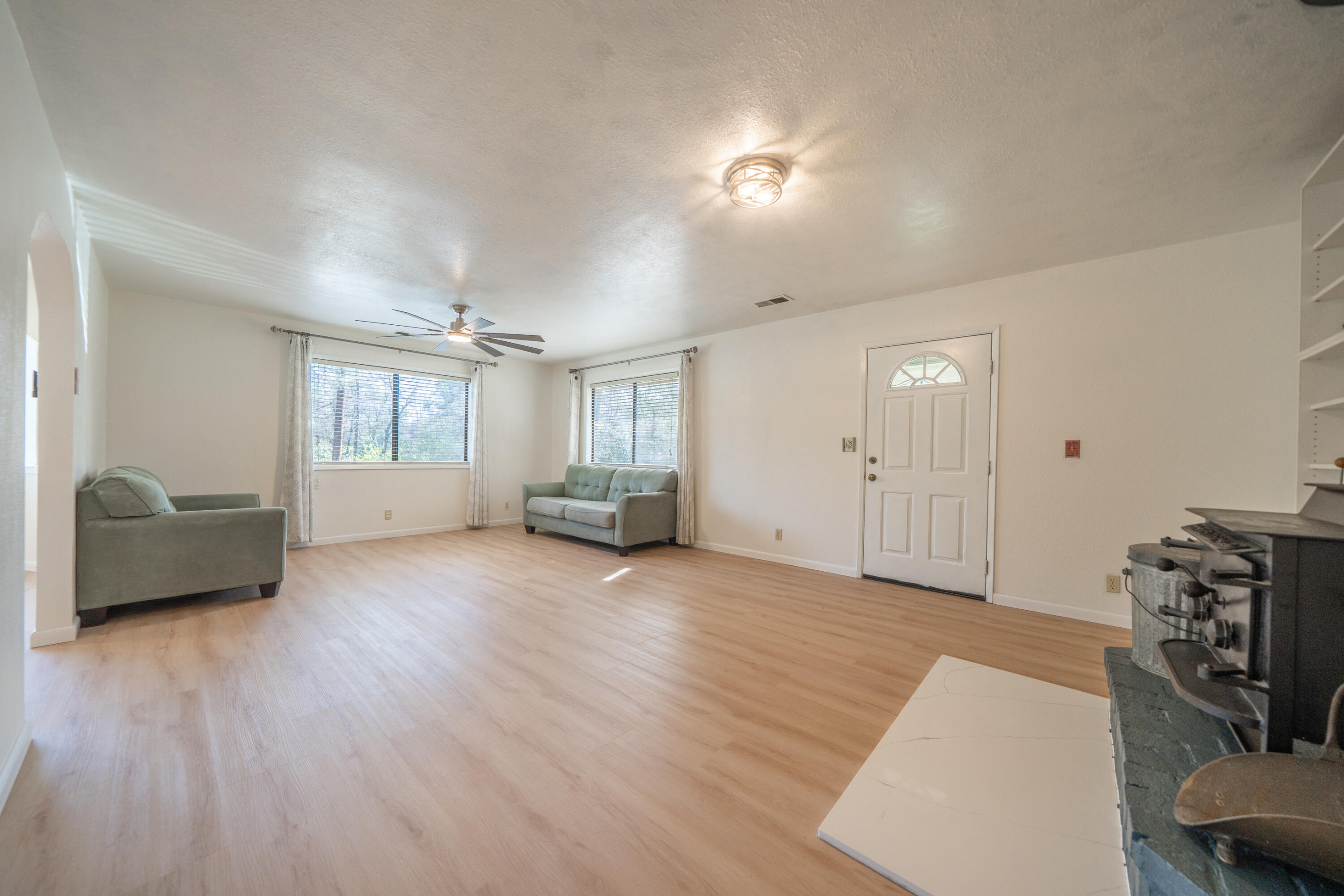 2580 Keswick Dam Road Redding, CA 96003 - Photo 5 of 60 a view of a livingroom with furniture and a flat screen tv