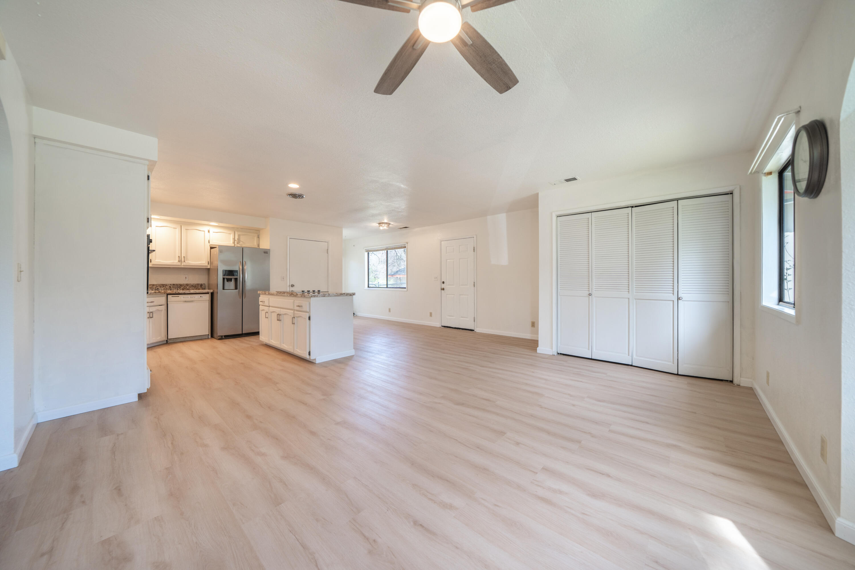 2580 Keswick Dam Road Redding, CA 96003 - Photo 8 of 60 a view of a kitchen with a sink and a refrigerator