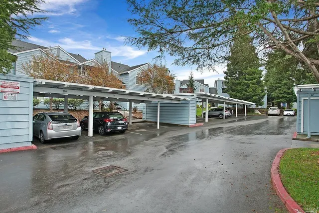 a view of a cars park in front of house
