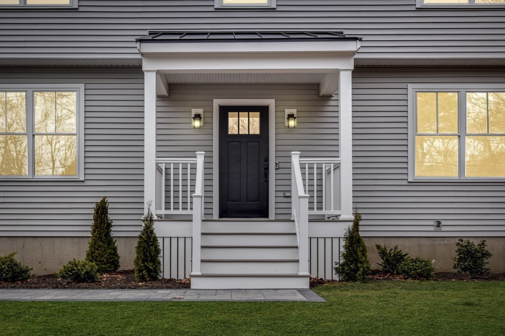 75 Cottage Street Natick, MA 01760 - Photo 2 of 37 a view of a house with a small garden