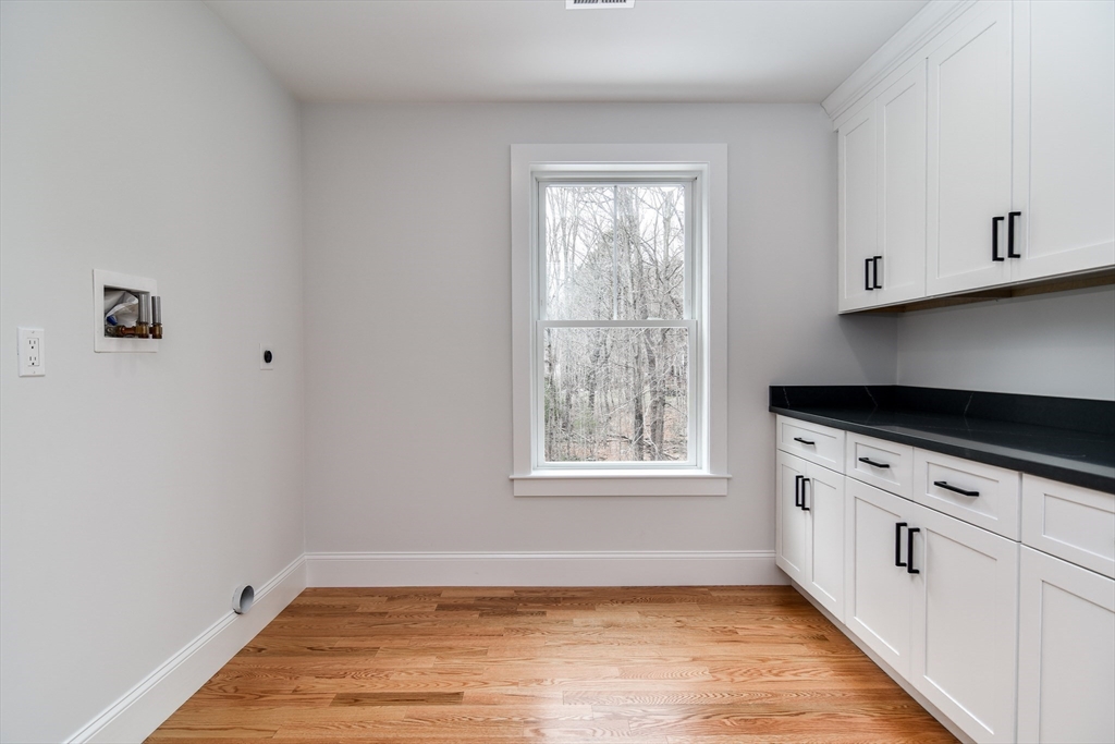 75 Cottage Street Natick, MA 01760 - Photo 24 of 37 wooden floor in an empty room with a window