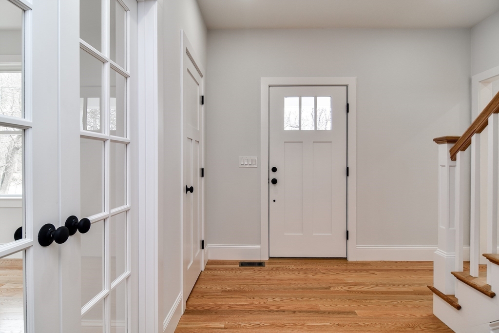 75 Cottage Street Natick, MA 01760 - Photo 3 of 37 a view of an entryway with a livingroom