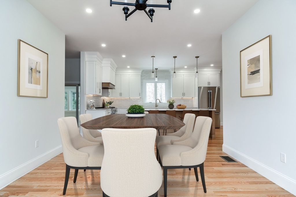 75 Cottage Street Natick, MA 01760 - Photo 6 of 37 a dining room with furniture and a wooden floor