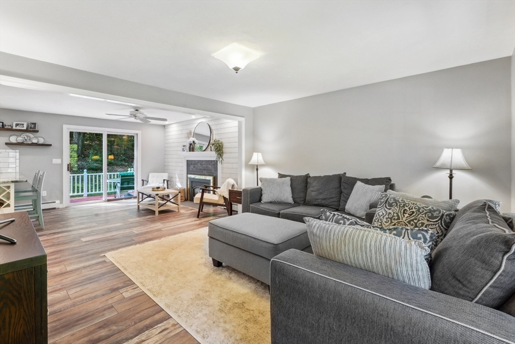 66 Dodge Road Sutton, MA 01590 - Photo 6 of 38 a living room with furniture and a large window