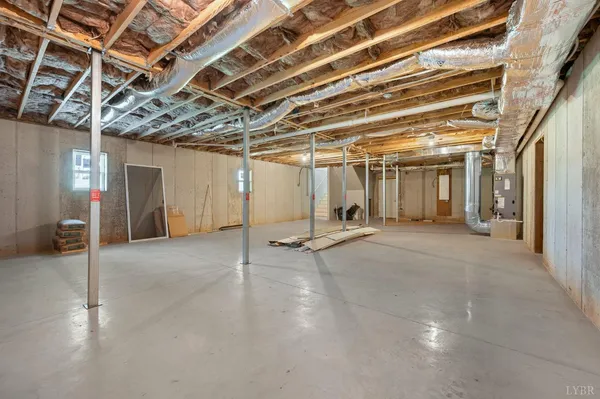 a view of a room with wooden walls