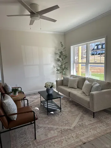 a living room with furniture and a window