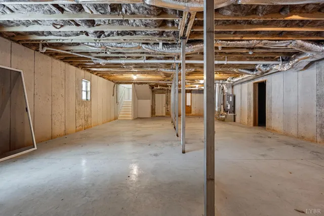 a view of a room with wooden walls