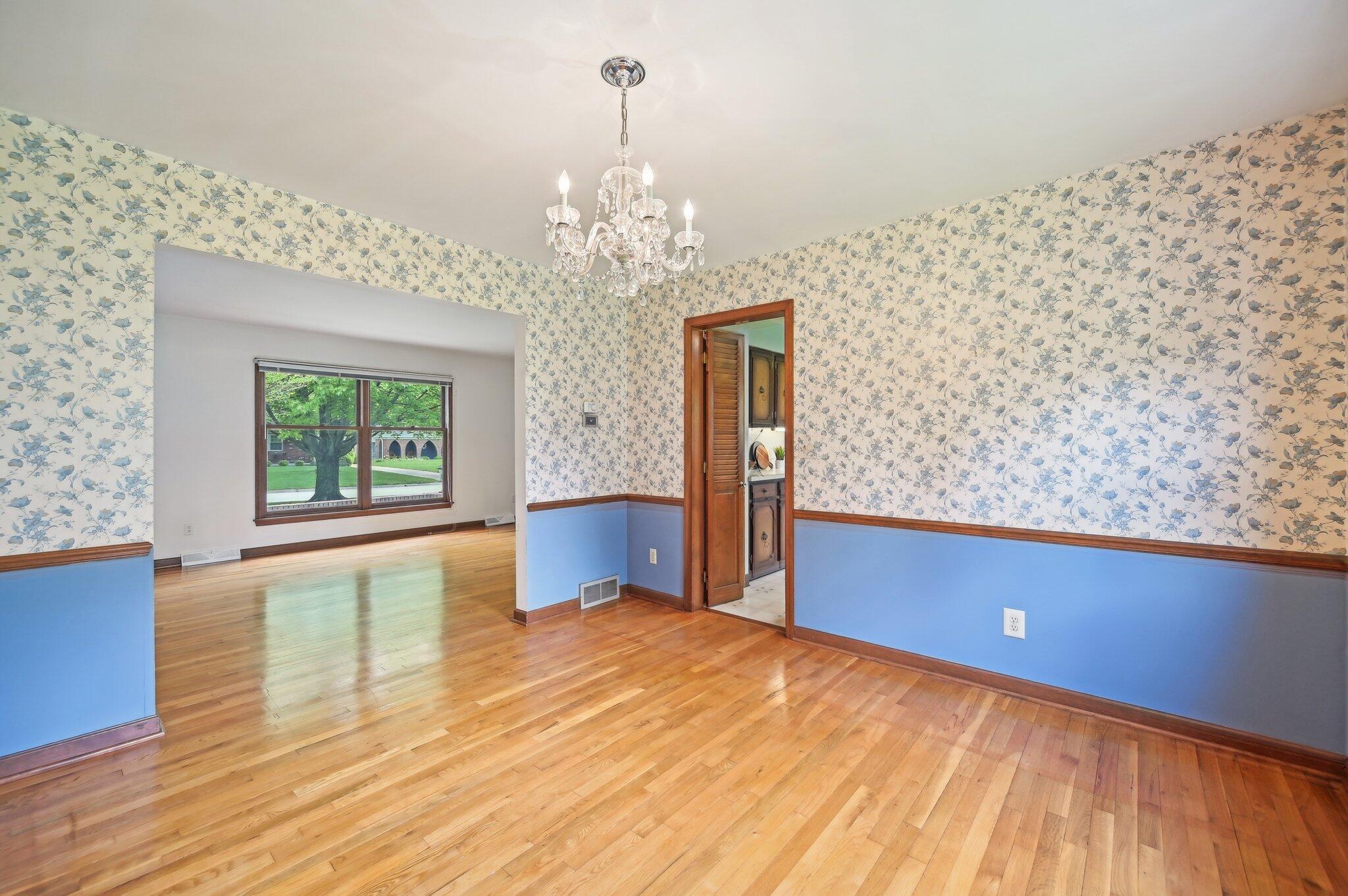 5917 Rocky Rill Road Columbus, OH 43235 - Photo 19 of 47 Dining Room – View to Living Room
Open flow from the dining room into the living room. Classic trim detail and hardwood floors throughout.