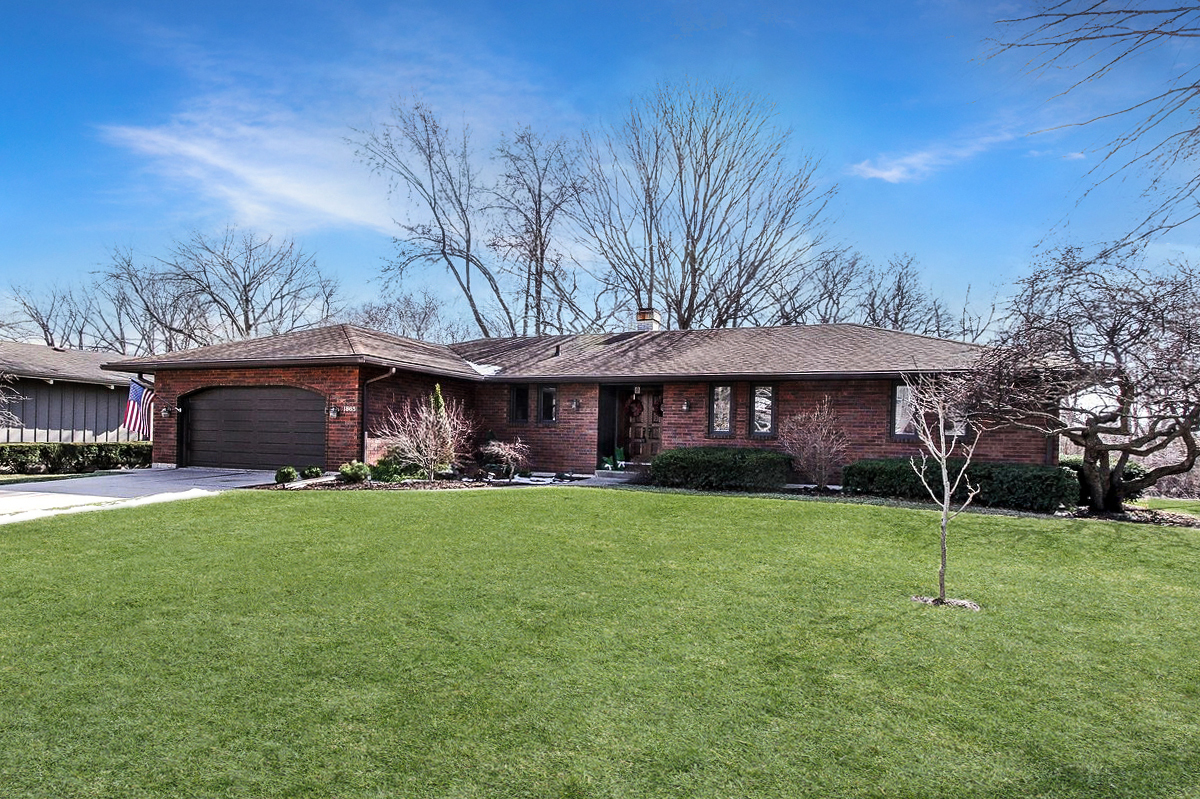 1865 Kevin Avenue Elgin, IL 60123 - Photo 1 of 48 a view of a house with a yard