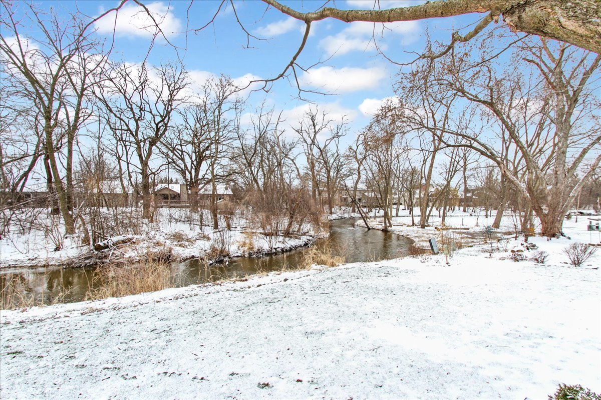 1865 Kevin Avenue Elgin, IL 60123 - Photo 12 of 48 a view of a snow with a yard