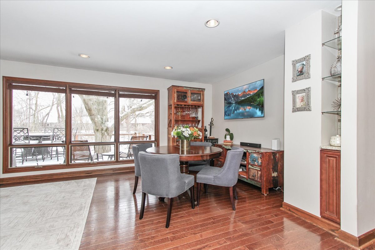 1865 Kevin Avenue Elgin, IL 60123 - Photo 20 of 48 a living room with furniture and a floor to ceiling window