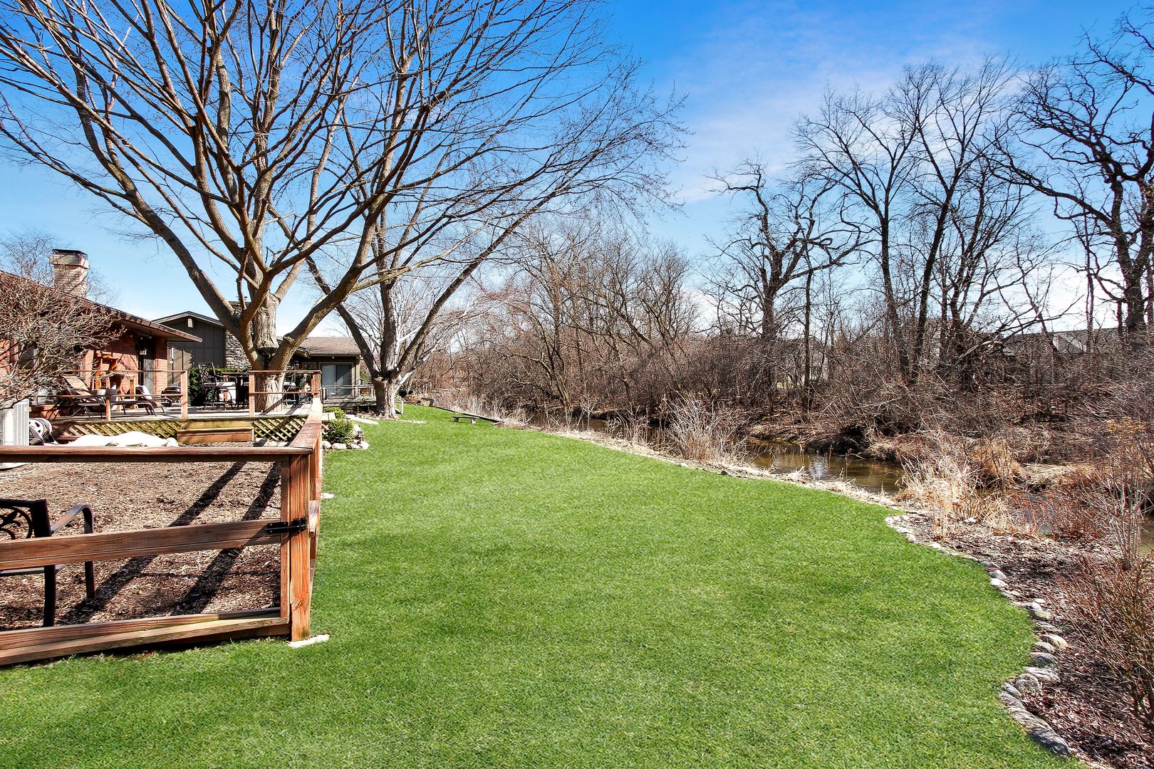 1865 Kevin Avenue Elgin, IL 60123 - Photo 40 of 48 a view of a backyard with table and chairs and a fire pit