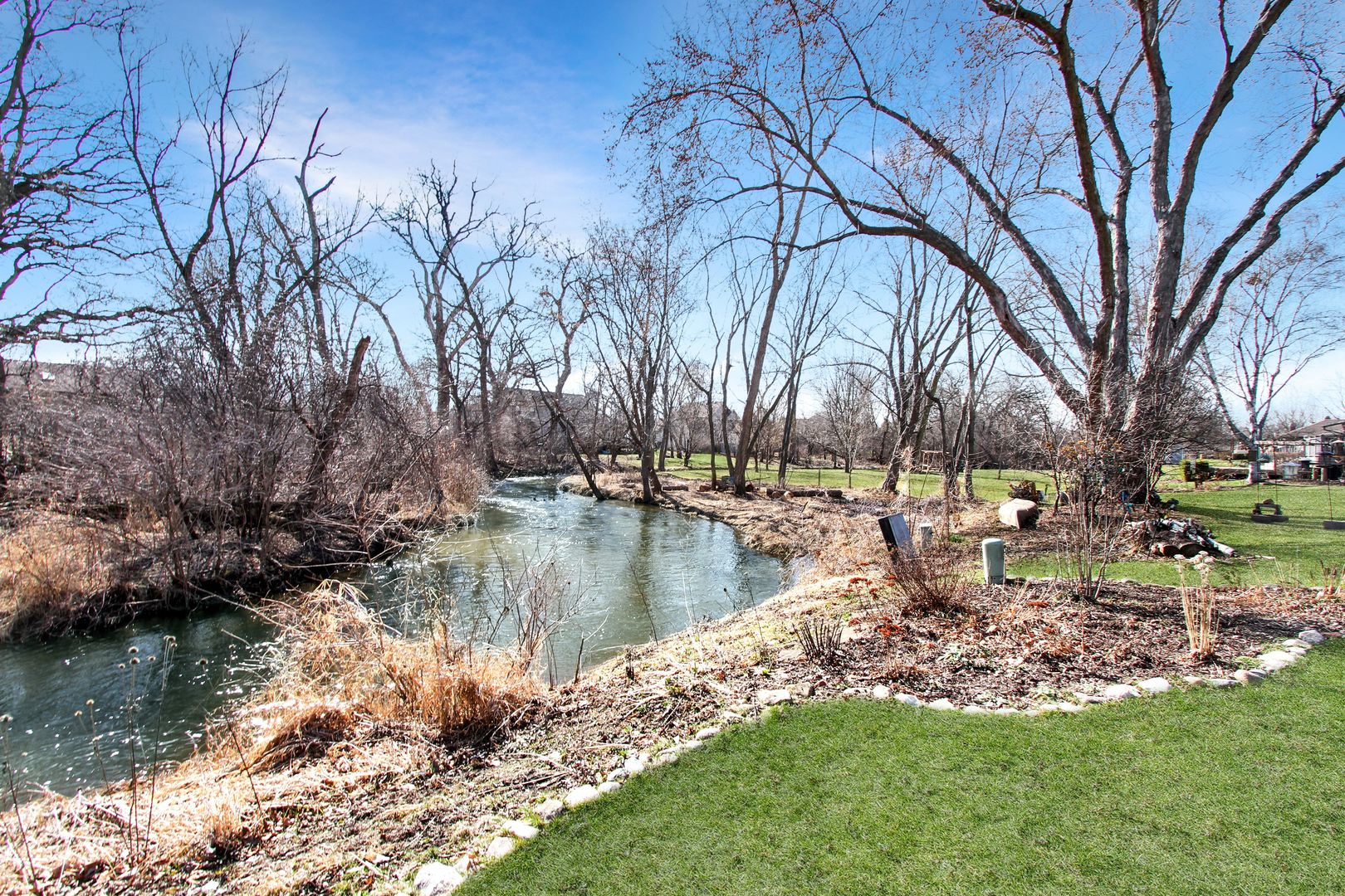 1865 Kevin Avenue Elgin, IL 60123 - Photo 8 of 48 a view of a lake with houses