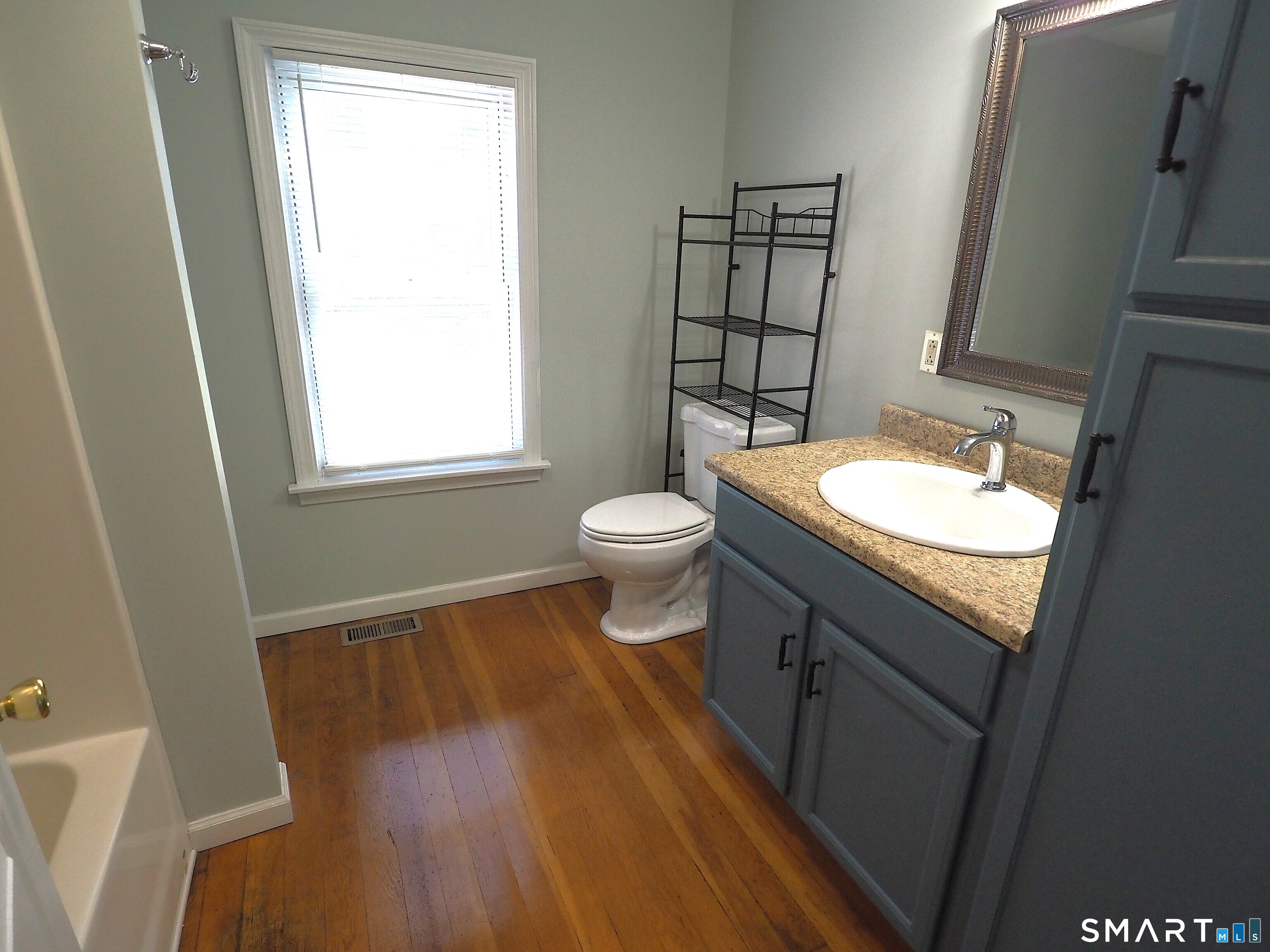 101 Lake Road Coventry, CT 06238 - Photo 11 of 25 Remodeled, stackable washer dryer in nook at far left
