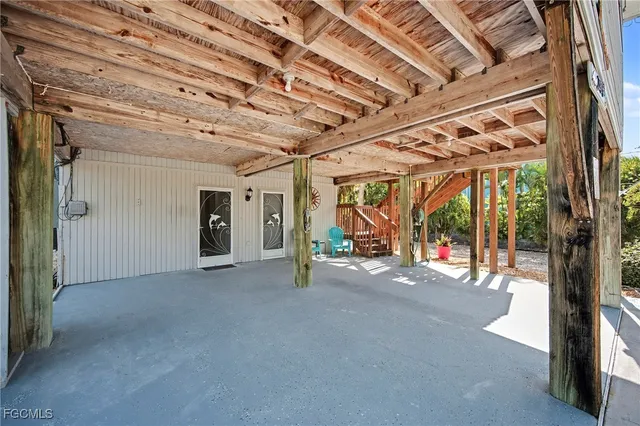 a view of a room with wooden walls
