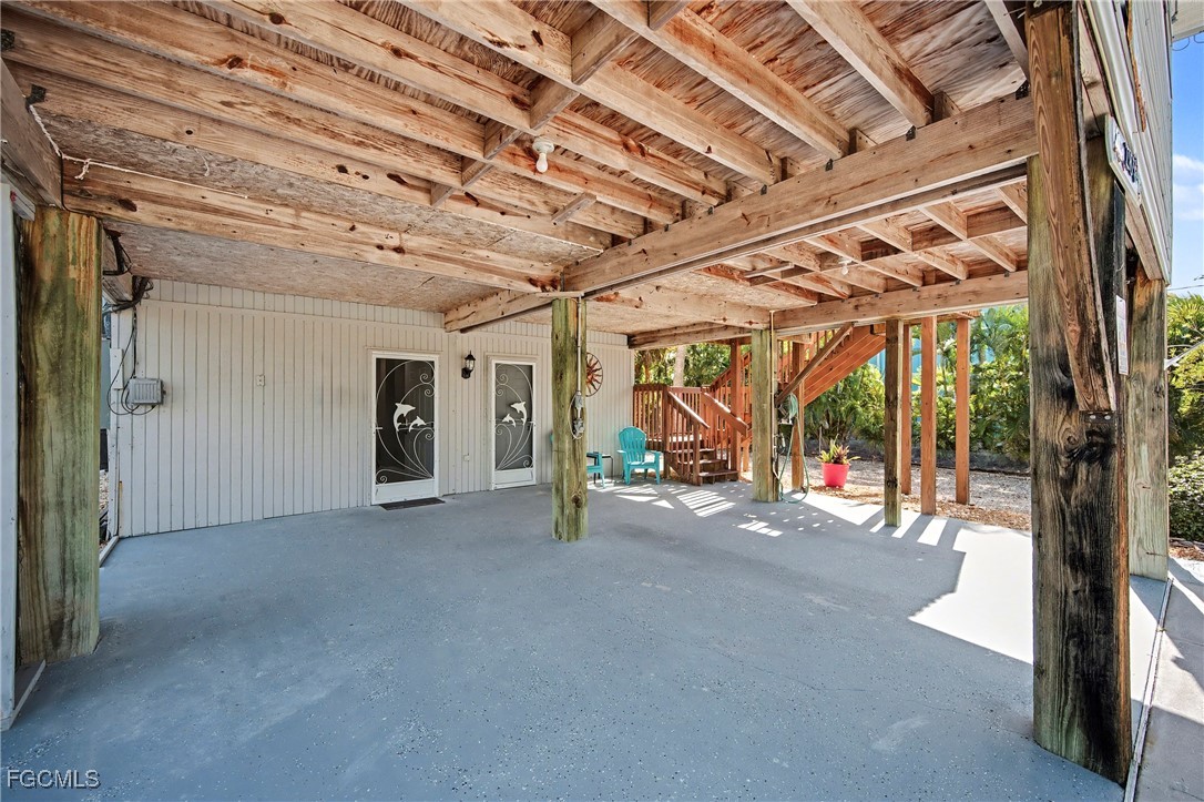 285 Dundee Road Fort Myers Beach, FL 33931 - Photo 33 of 42 a view of a room with wooden walls