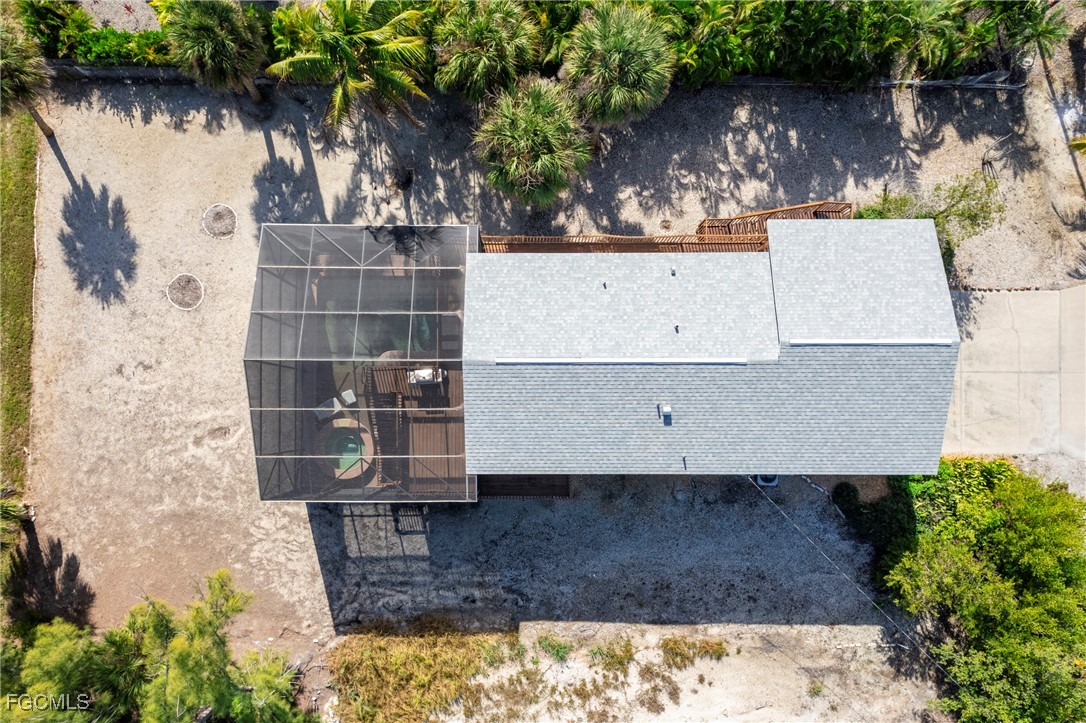 285 Dundee Road Fort Myers Beach, FL 33931 - Photo 35 of 42 an aerial view of a house with a yard
