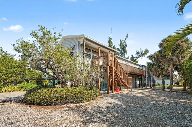 a view of balcony with wooden floor