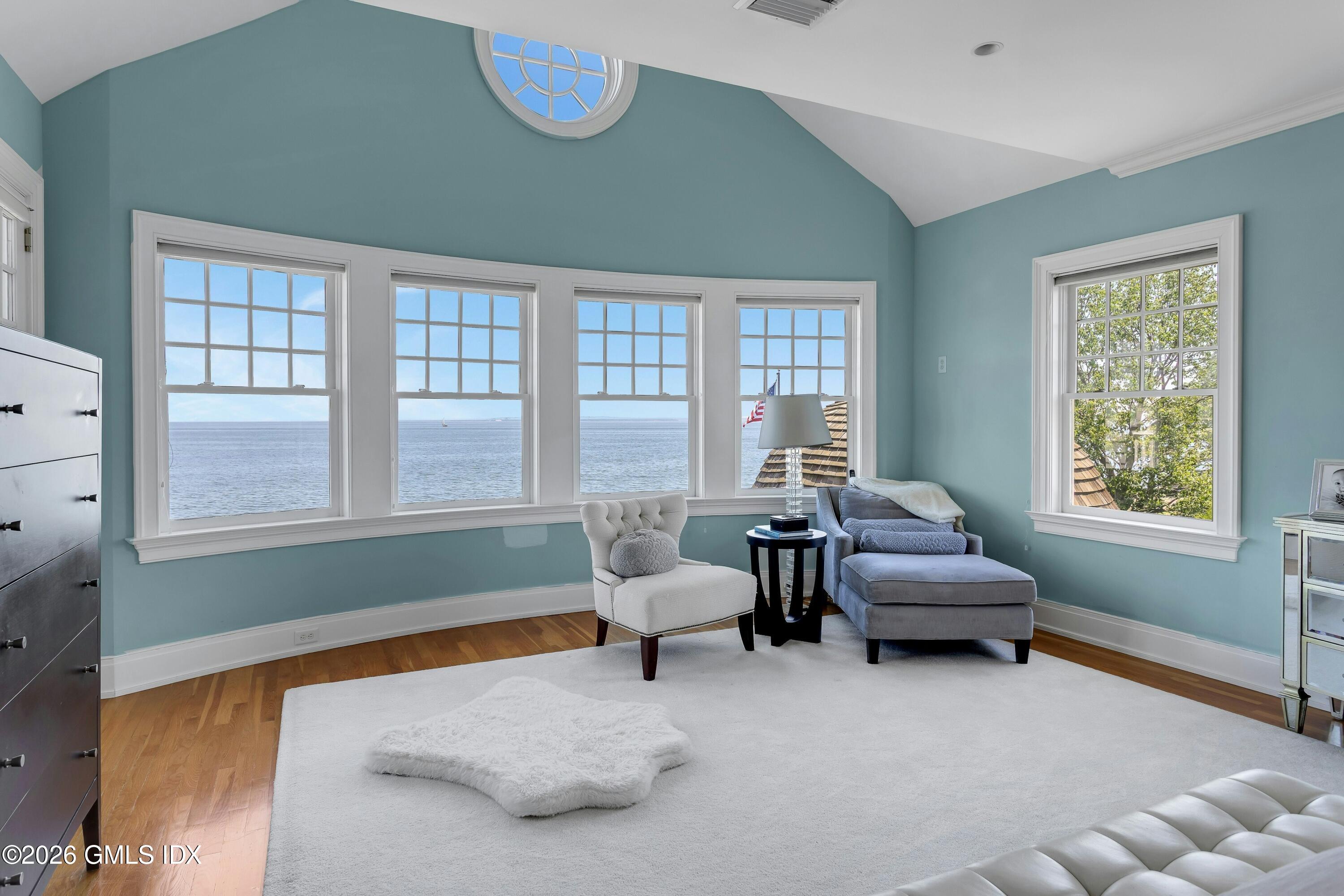 200 Shore Road Old Greenwich, CT 06870 - Photo 13 of 34 a living room with furniture and a window