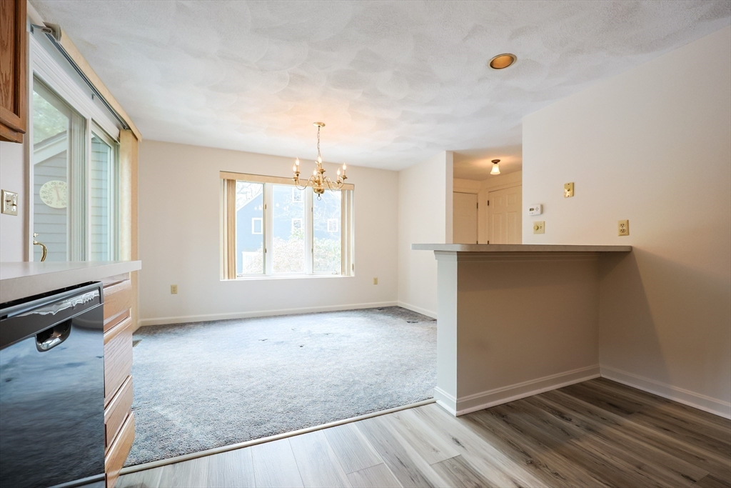 22 Deer Path, Unit 6 Maynard, MA 01754 - Photo 19 of 34 an empty room with windows