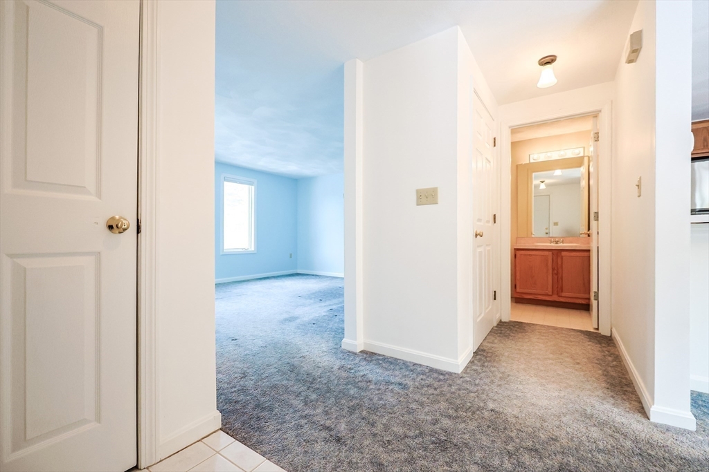 22 Deer Path, Unit 6 Maynard, MA 01754 - Photo 20 of 34 a view of a bathroom with a shower