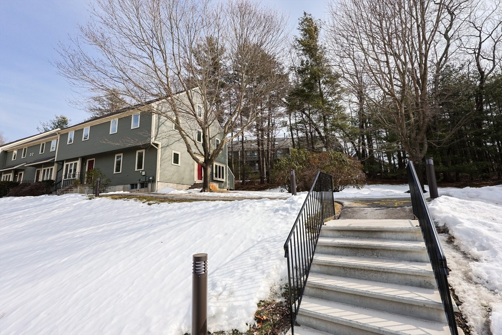 22 Deer Path, Unit 6 Maynard, MA 01754 - Photo 31 of 34 a view of a yard in front of house