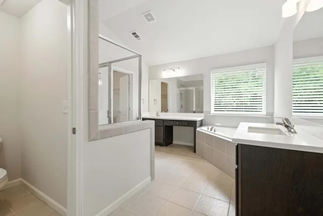 a kitchen with a sink and a stove top oven