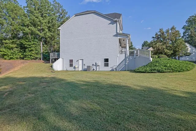 a house view with garden space