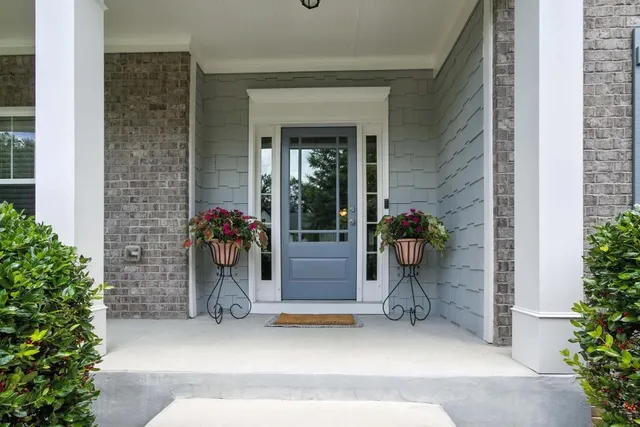 a front view of a house with porch