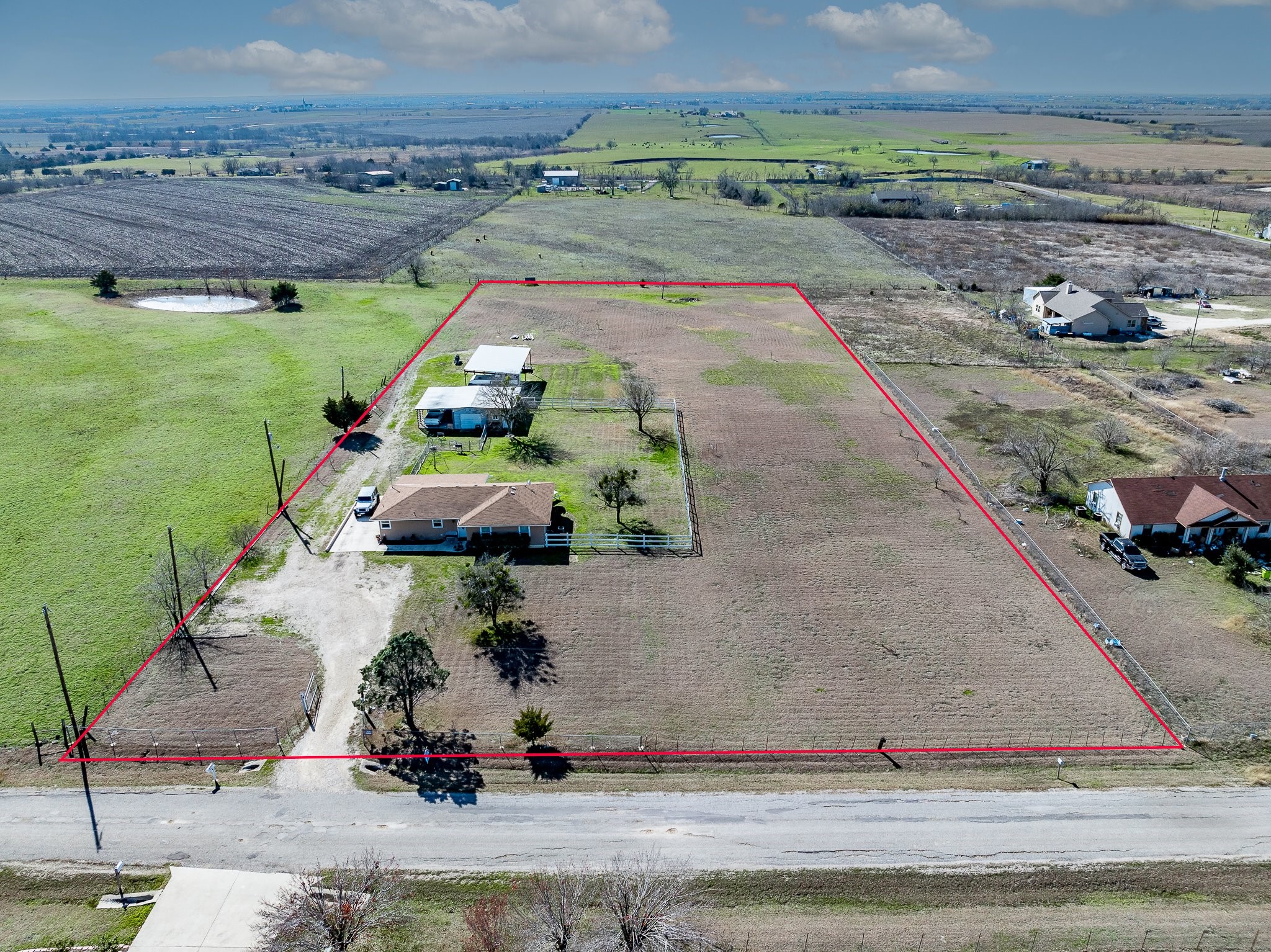 12201 McCurry Road Coupland, TX 78615 - Photo 1 of 1 Two lots sold together. Empty side lot is 1.665 acres with flexible building opportunities