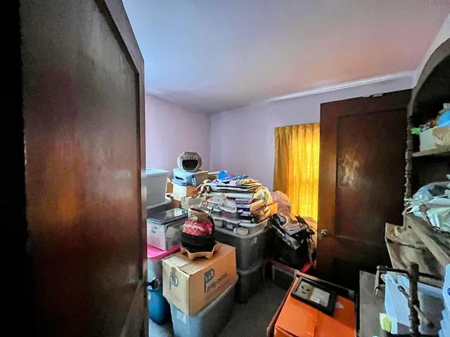 a room with furniture and a flat screen tv