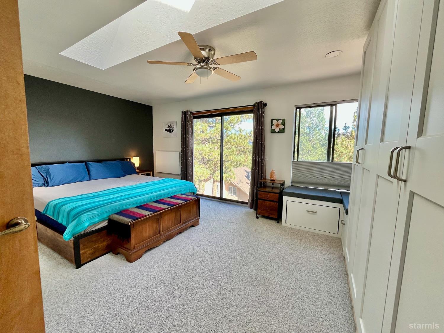 50 Canon View Markleeville, CA 96120 - Photo 10 of 21 a bedroom with a bed and a chandelier