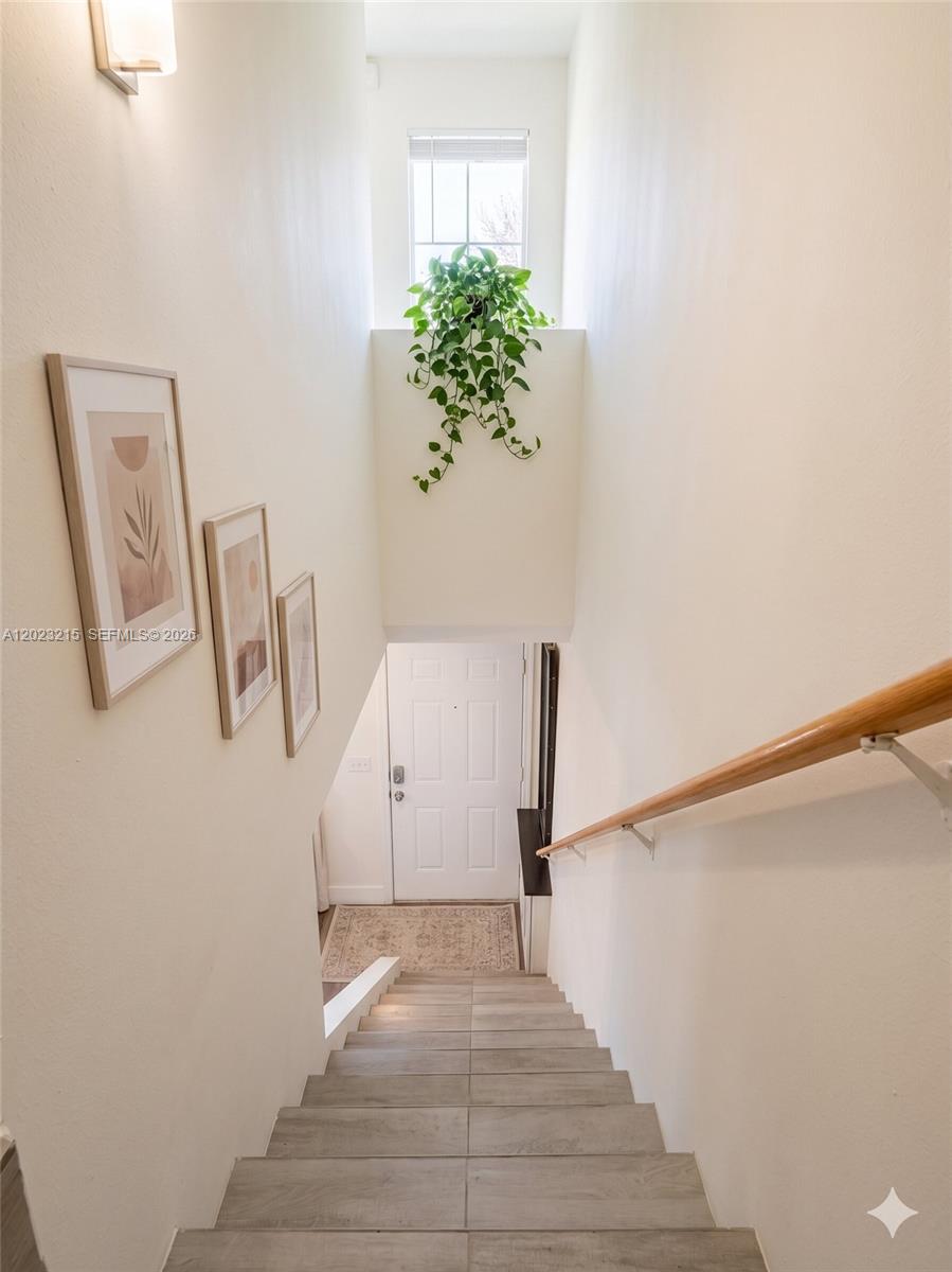 13 Southwest 3rd Street, Unit 13 Pompano Beach, FL 33060 - Photo 16 of 44 a view of entryway and hall with wooden floor