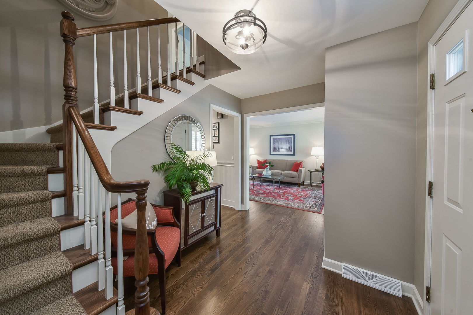 1213 West Bauer Road Naperville, IL 60563 - Photo 2 of 27 a view of entryway livingroom and hall with wooden floor