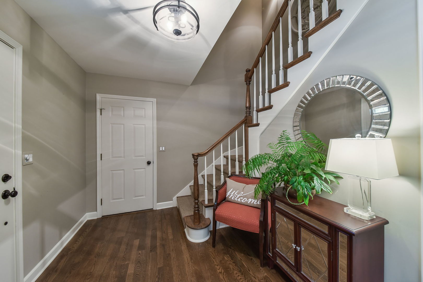 1213 West Bauer Road Naperville, IL 60563 - Photo 3 of 27 a view of entryway livingroom and hall with wooden floor