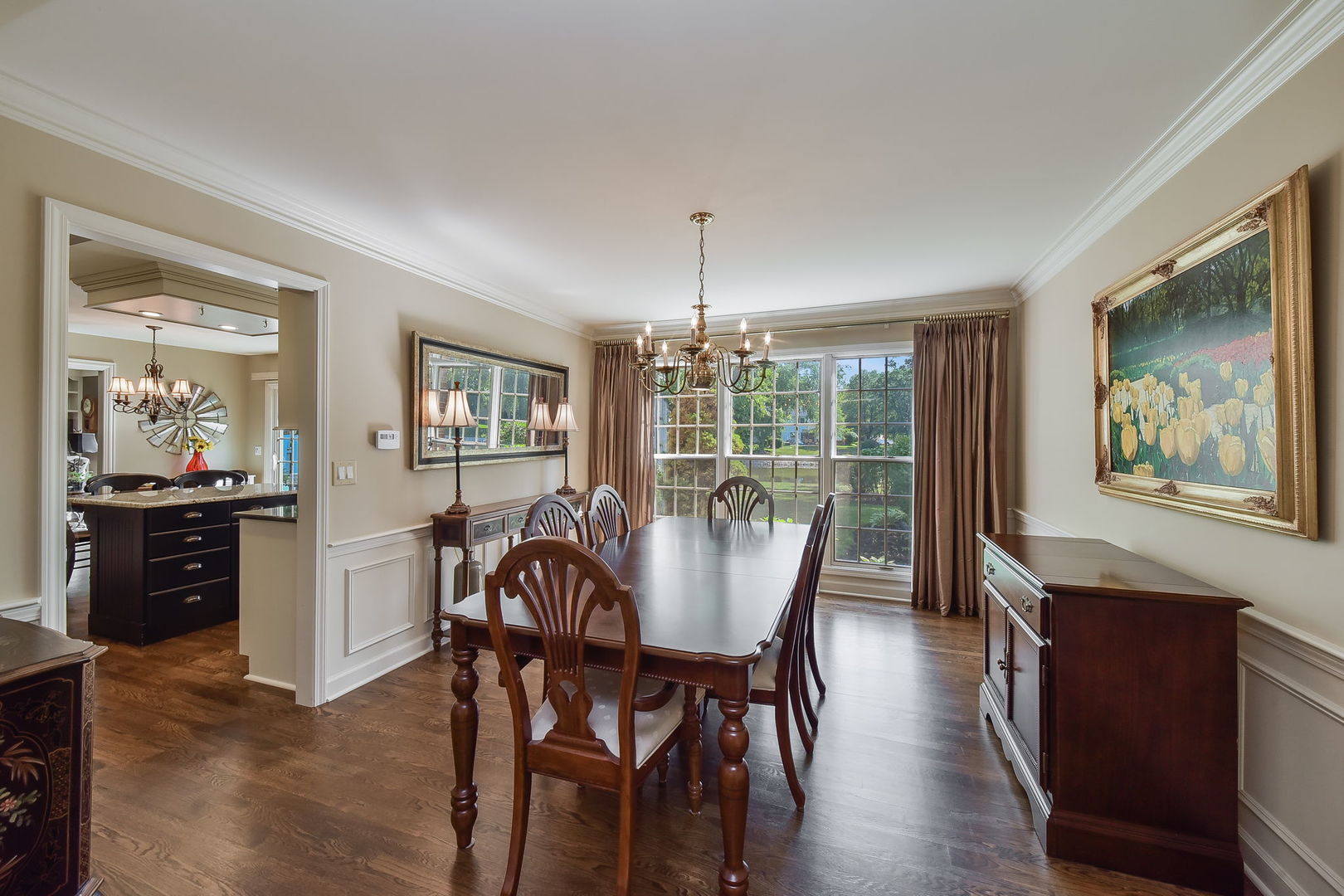 1213 West Bauer Road Naperville, IL 60563 - Photo 6 of 27 a view of a dining room with furniture window and wooden floor