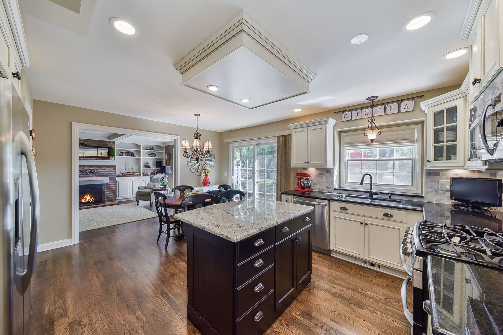 1213 West Bauer Road Naperville, IL 60563 - Photo 8 of 27 a kitchen with a stove and a refrigerator