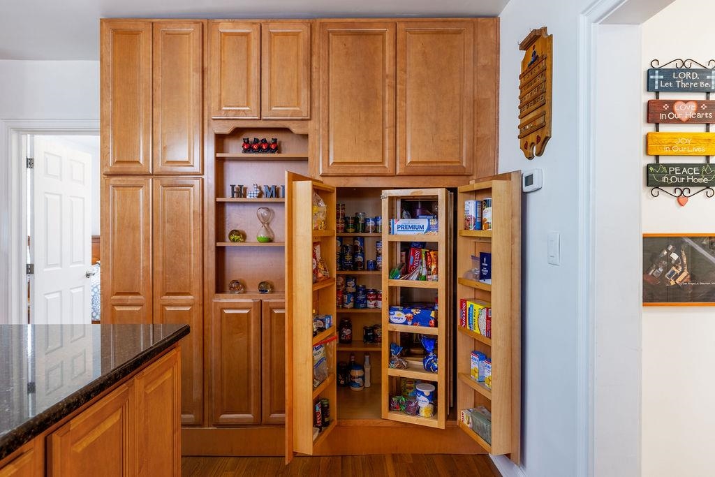 22 Oak Ridge Lane Staunton, VA 24401 - Photo 18 of 62 Large pantry provides excellent storage and organization space, keeping the kitchen functional and clutter-free.