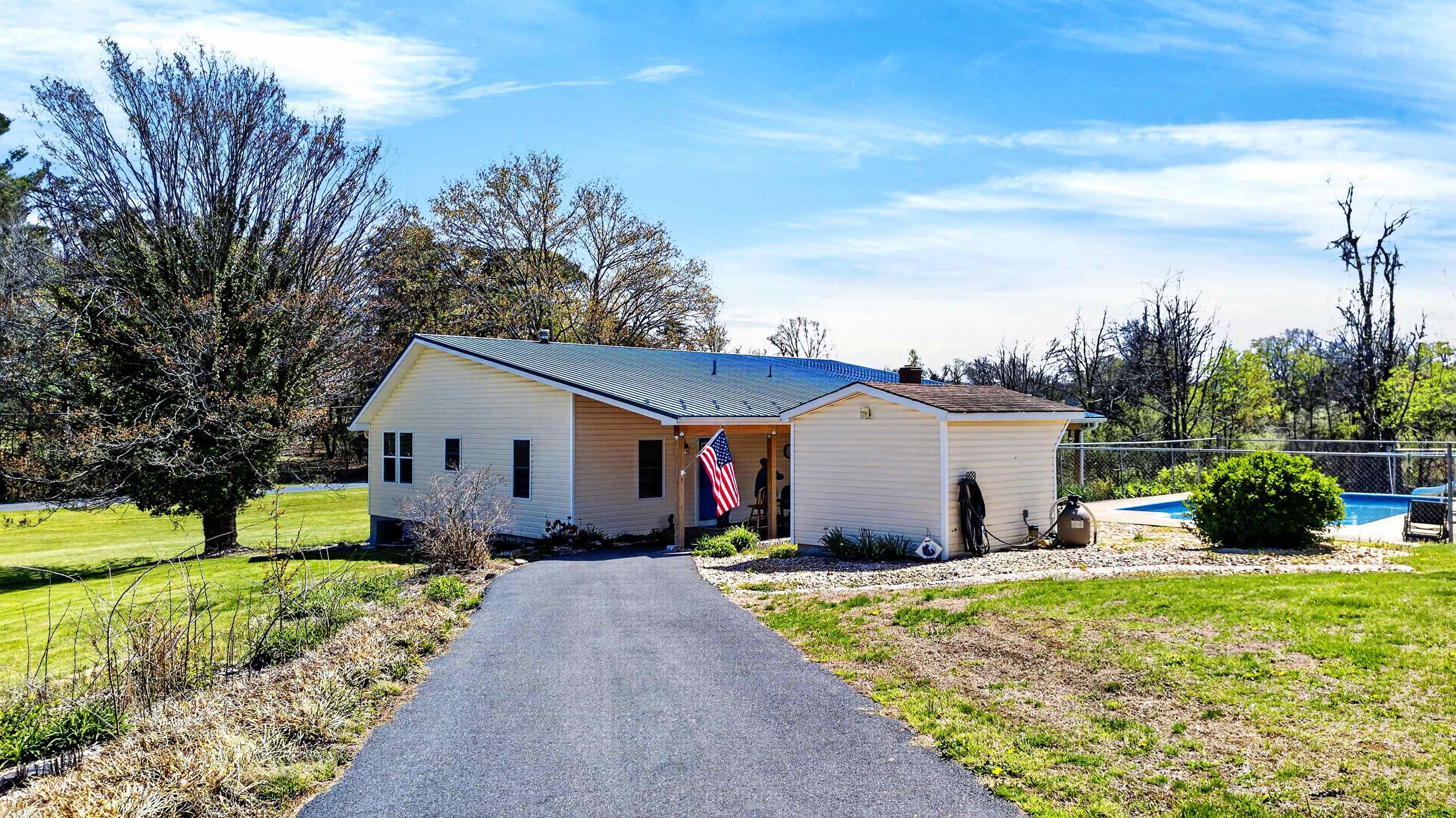 22 Oak Ridge Lane Staunton, VA 24401 - Photo 2 of 62 Paved driveway leads to the home’s primary entrance with easy access and convenient everyday flow for one-level living.