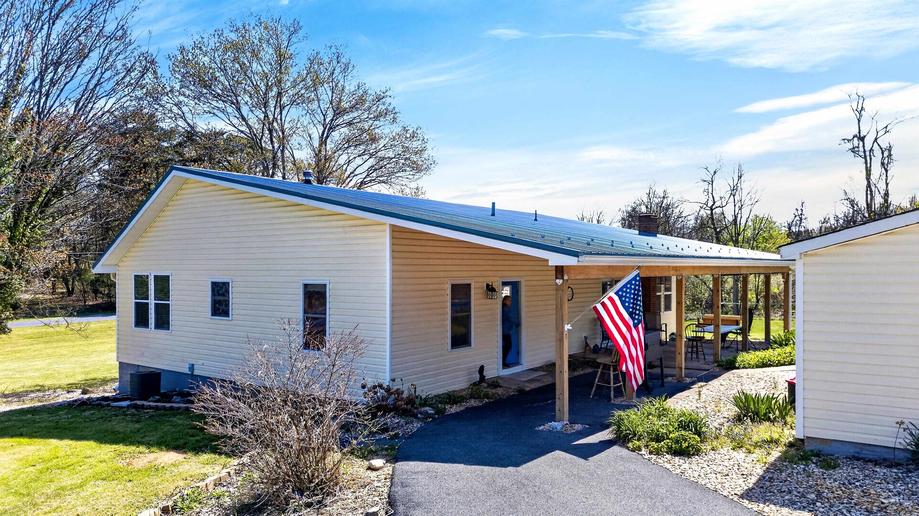 22 Oak Ridge Lane Staunton, VA 24401 - Photo 3 of 62 Covered front porch entry with easy access from the driveway, offering comfortable one-level living and a welcoming first impression.