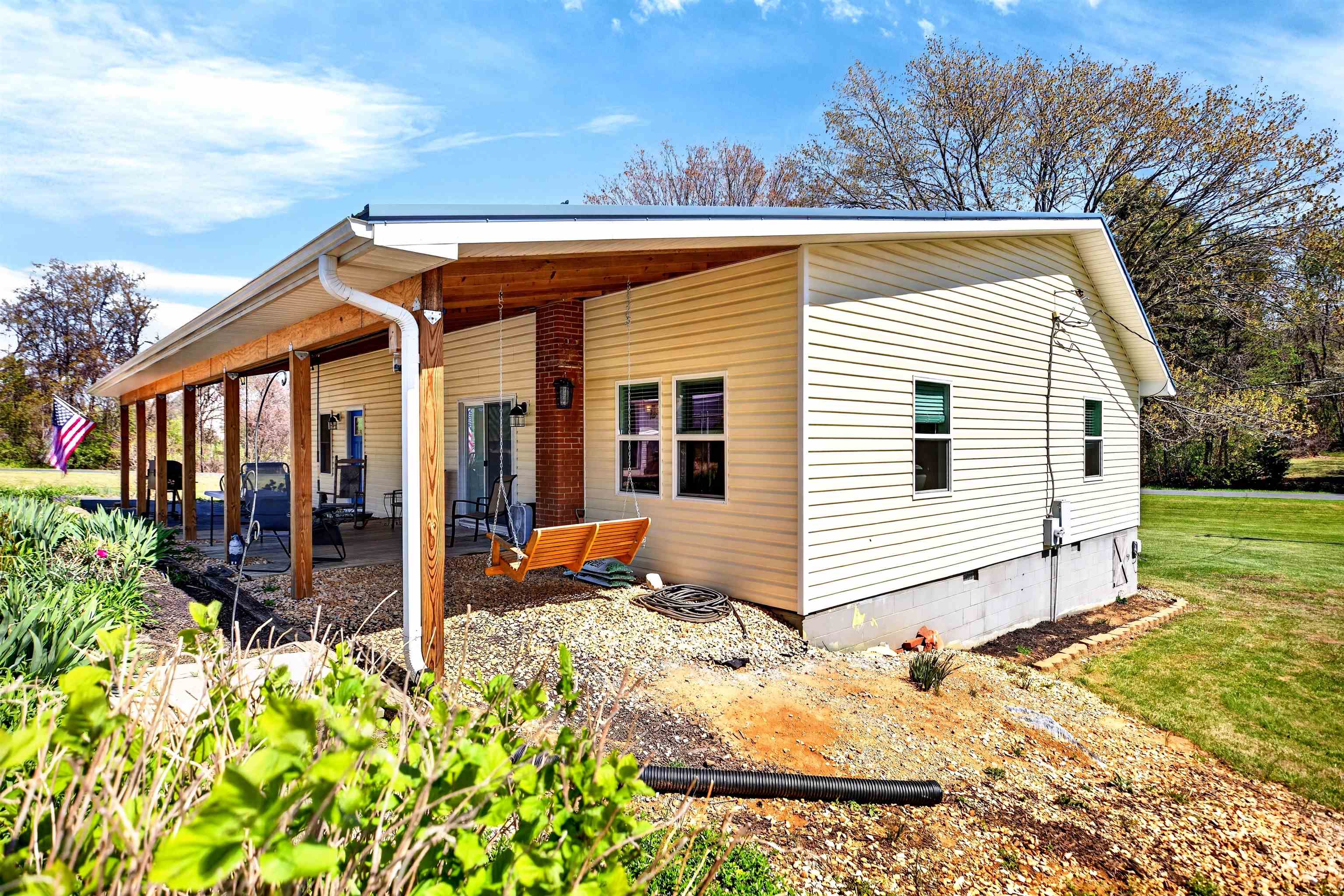 22 Oak Ridge Lane Staunton, VA 24401 - Photo 5 of 62 Covered patio area with convenient side entry offers easy indoor-outdoor flow and a great space for relaxing or entertaining.