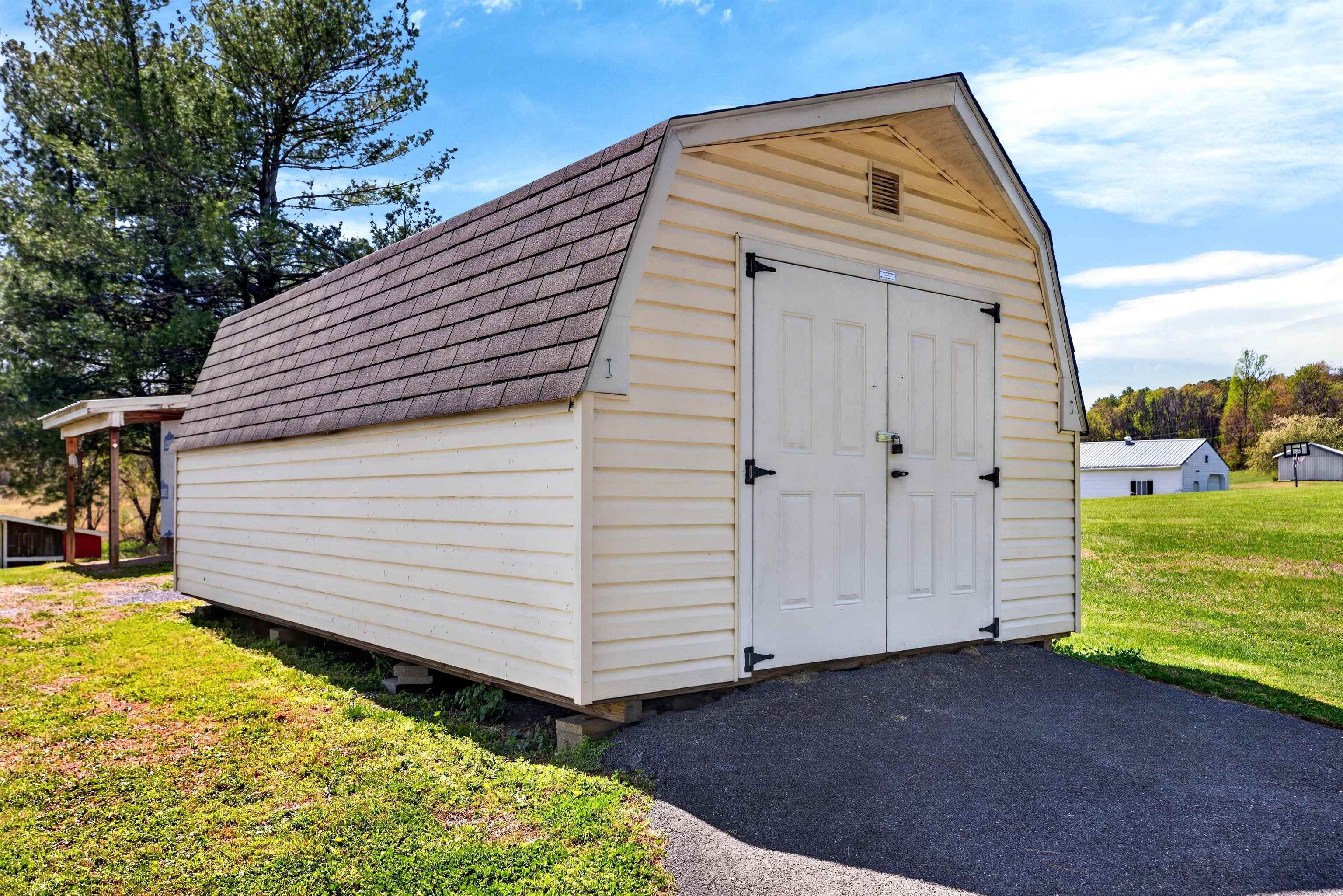 22 Oak Ridge Lane Staunton, VA 24401 - Photo 53 of 62 Byler barn conveys with the property, offering additional storage for equipment, tools, or outdoor items.