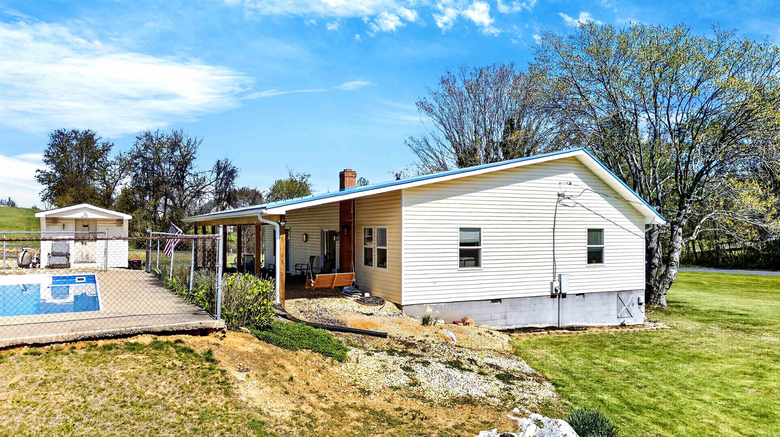 22 Oak Ridge Lane Staunton, VA 24401 - Photo 7 of 62 Outdoor living area featuring the pool, patio, and open yard space — designed for relaxing, entertaining, and everyday enjoyment.