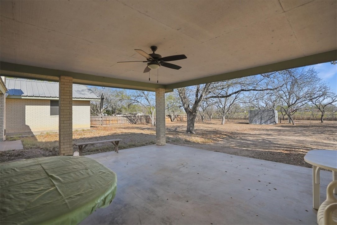 1309 Burleson Street George West, TX 78022 - Photo 29 of 32 a big room with wooden floor and balcony