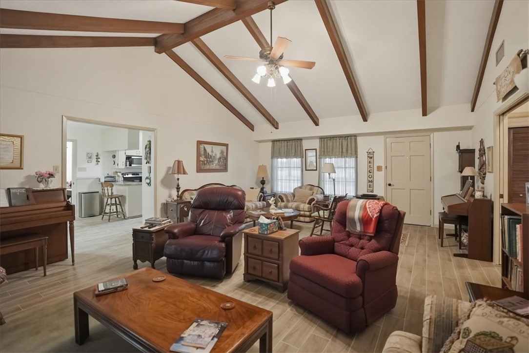 1309 Burleson Street George West, TX 78022 - Photo 5 of 32 a living room with furniture