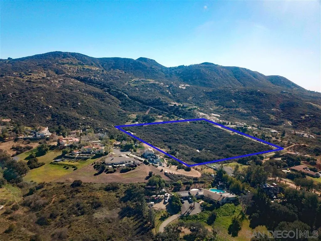 . Lyons Valley Road Jamul, CA 91935 - Photo 7 of 14 a view of a lush green hillside and a houses